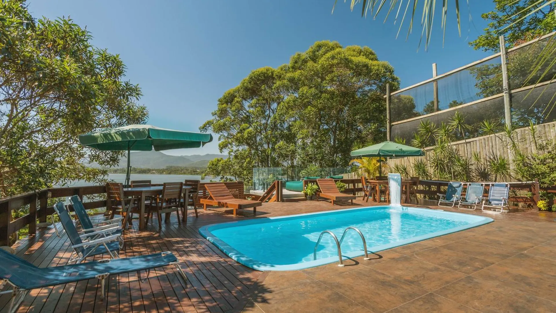 Casa de Férias Recanto Lagoa - Casas Completas Na Beira Da Lagoa Com Piscina Aquecida, Jacuzzi Privativa, Mesa De Sinuca E Muito Mais Praia do Rosa